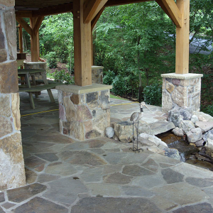 Stone patio architecture by Home Tech Construction Services