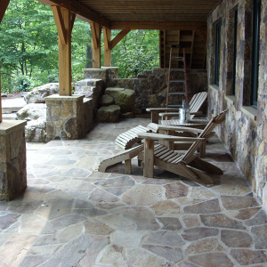 Stone patio design by Home Tech Construction Services