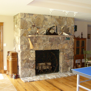 Store fireplace by Home Tech Construction Services
