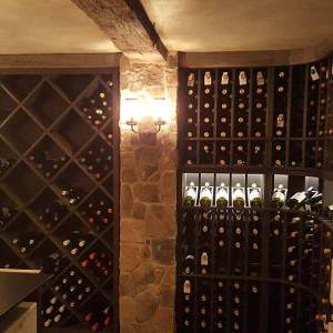 Wine cellar by Home Tech Construction Services